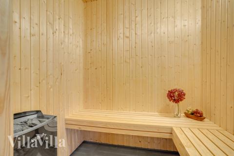 Genießen Sie die heiße Sauna im Luxusferienhaus Nr. 496 für 26 Personen