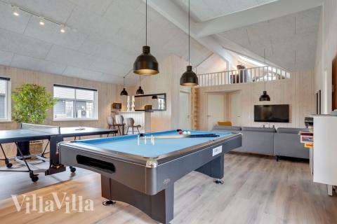 Das Luxusferienhaus 508 für 20 Personen hat einen großen Aktivitätsraum mit u. a. Billard und Darts