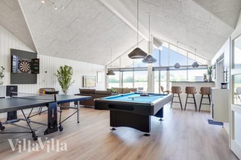 Neben den vielen schönen Stunden, die man im Poolbereich des Hauses verbringen kann, bietet das Luxusferienhaus 531 auch Spielevergnügen bei Billard/Tischtennis und Darts