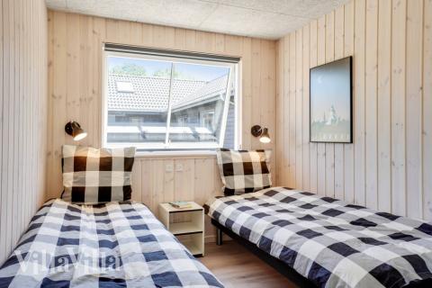 Eines der 12 Schlafzimmer im Luxusferienhaus Nr. 531