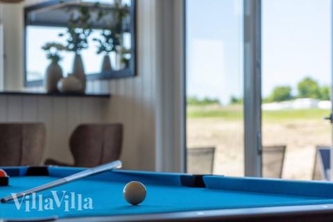 Aktivitätsraum im Luxusferienhaus Nr. 531 mit 12 Schlafzimmern und Platz für 30 Gäste.