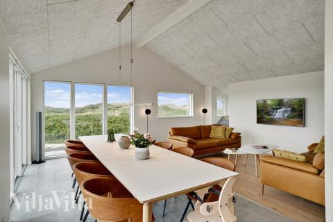 Der Aufenthaltsraum bietet Platz für 10 Personen, wenn ihr das Ferienhaus 514 in Nordjütland besucht.