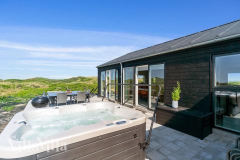 Im Luxusferienhaus Nr. 514 gibt es einen Whirlpool und 5 Schlafzimmer.