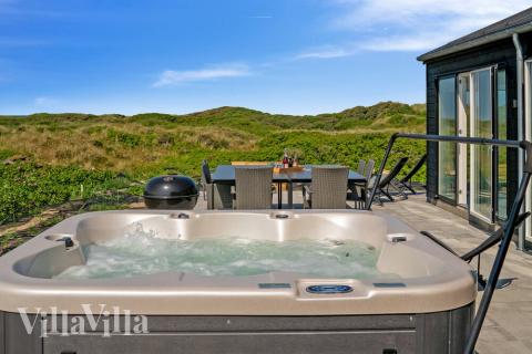 Diese schicke Haus mit Whirlpool Nr. 514 mit Platz für 10 Personen liegt in Nordjütland