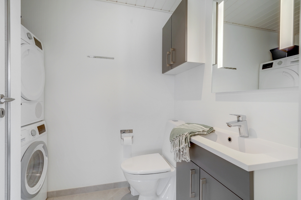 Eines der Badezimmer im Luxusferienhaus Nr. 516