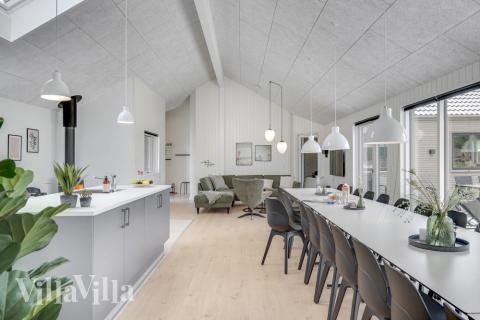 Aufenthaltsraum mit Platz für 24 im Luxusferienhaus Nr. 516.