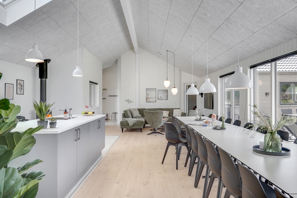 Aufenthaltsraum mit Platz für 24 im Luxusferienhaus Nr. 516.