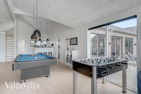 Aktivitätsraum im Luxusferienhaus Nr. 516 mit 9 Schlafzimmern und Platz für 24 Gäste.