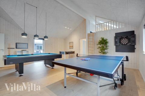 Aktivitätsraum im Luxusferienhaus Nr. 526 mit 8 Schlafzimmern und Platz für 20 Gäste.