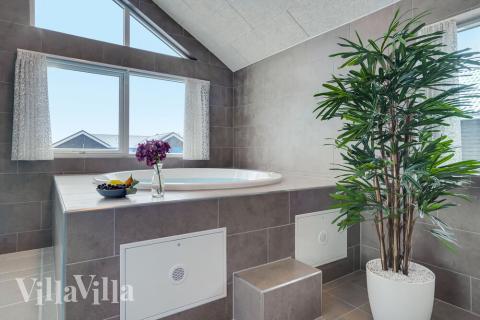 Genießen Sie den warmen Whirlpool im Luxusferienhaus Nr. 526 in Südjütland
