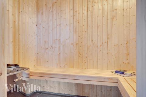 Genießen Sie die heiße Sauna im Luxusferienhaus Nr. 526 für 20 Personen