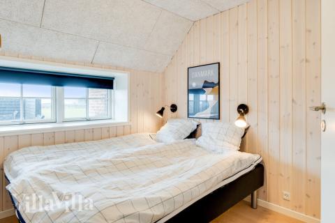 Eines der 10 Schlafzimmer im Luxusferienhaus Nr. 528