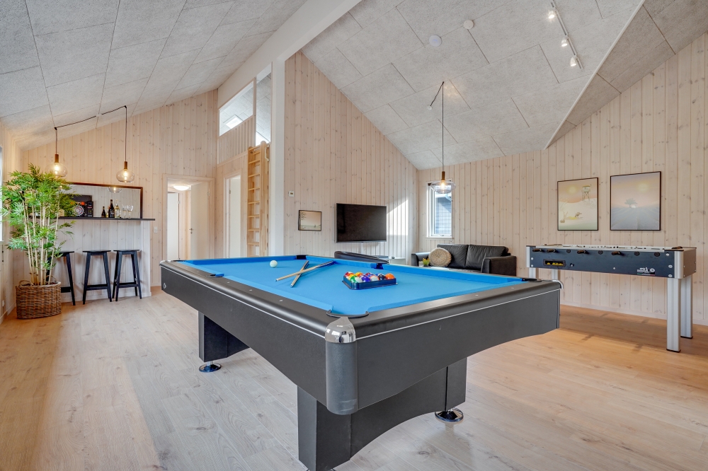 Neben den vielen schönen Stunden, die man im Poolbereich des Hauses verbringen kann, bietet das Luxusferienhaus 488 auch Spielevergnügen bei Billard/Tischtennis und Darts