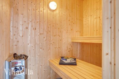 Genießen Sie die heiße Sauna im Luxusferienhaus Nr. 488 für 18 Personen