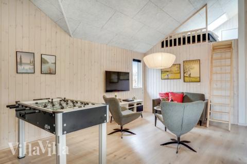 Das Luxusferienhaus 527 für 16 Personen hat einen großen Aktivitätsraum mit u. a. Billard und Darts