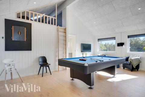Aktivitätsraum im Luxusferienhaus Nr. 533 mit 5 Schlafzimmern und Platz für 14 Gäste.