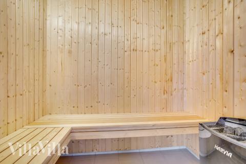 Genießen Sie die heiße Sauna im Luxusferienhaus Nr. 529 für 20 Personen