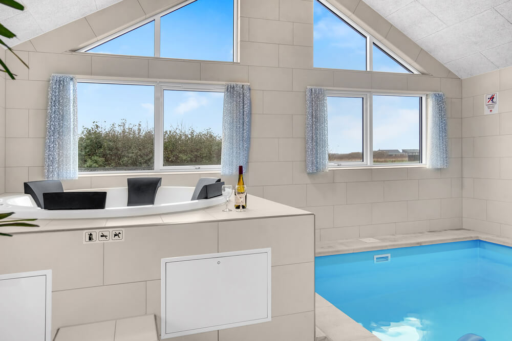 Genießen Sie den warmen Whirlpool im Luxusferienhaus Nr. 529 in Nordjütland
