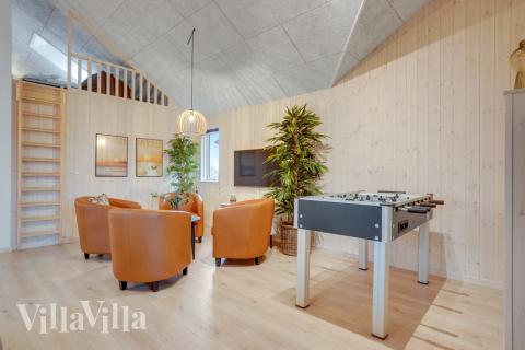 Das Luxusferienhaus 524 für 16 Personen hat einen großen Aktivitätsraum mit u. a. Billard und Darts