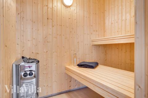 Genießen Sie die heiße Sauna im Luxusferienhaus Nr. 524 für 16 Personen