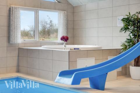 Genießen Sie den warmen Whirlpool im Luxusferienhaus Nr. 524 in Südjütland