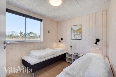 Eines der 7 Schlafzimmer im Luxusferienhaus Nr. 523