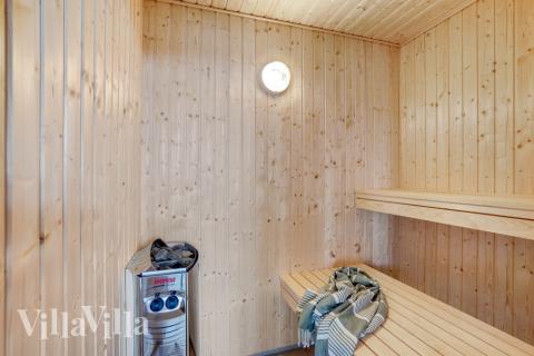 Genießen Sie die heiße Sauna im Luxusferienhaus Nr. 523 für 18 Personen