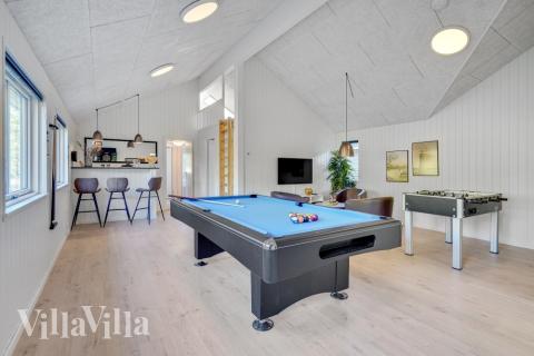 Neben den vielen schönen Stunden, die man im Poolbereich des Hauses verbringen kann, bietet das Luxusferienhaus 536 auch Spielevergnügen bei Billard/Tischtennis und Darts