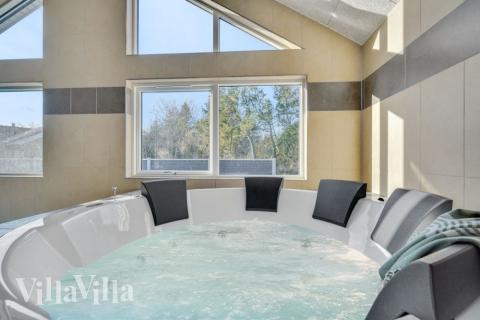 Genießen Sie den warmen Whirlpool im Luxusferienhaus Nr. 536 in Westjütland