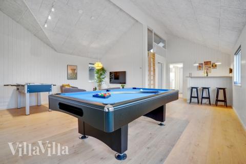 Neben den vielen schönen Stunden, die man im Poolbereich des Hauses verbringen kann, bietet das Luxusferienhaus 537 auch Spielevergnügen bei Billard/Tischtennis und Darts