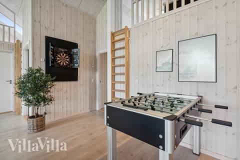 Aktivitätsraum im Luxusferienhaus Nr. 535 mit 8 Schlafzimmern und Platz für 20 Gäste.