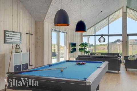 Aktivitätsraum im Luxusferienhaus Nr. 542 mit 10 Schlafzimmern und Platz für 26 Gäste.