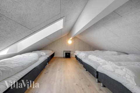 Der große ausgebaute Dachboden im Luxusferienhaus Nr. 542 für 26 Personen