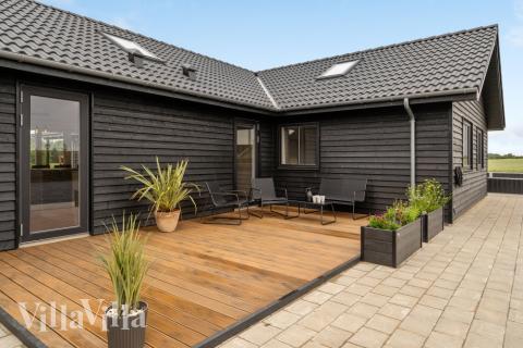 Das Luxusferienhaus Nr. 546 hat eine tolle Terrasse, die mit hochwertigen Gartenmöbeln für 30 Personen ausgestattet ist.