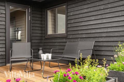 Genießen Sie einen Grillabend auf der Terrasse des Luxusferienhauses Nr. 546 in Limfjord