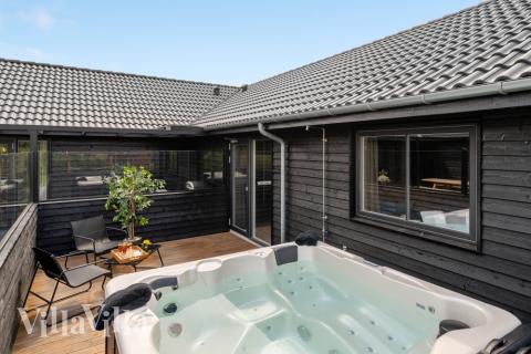 Das Luxusferienhaus Nr. 546 bietet u. a. einen tollen Whirlpool