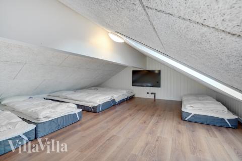 Der große ausgebaute Dachboden im Luxusferienhaus Nr. 546 für 30 Personen