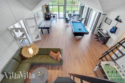 Neben den vielen schönen Stunden, die man im Poolbereich des Hauses verbringen kann, bietet das Luxusferienhaus 546 auch Spielevergnügen bei Billard/Tischtennis und Darts