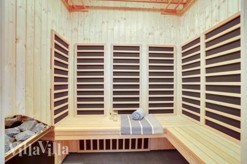 Genießen Sie die heiße Sauna im Luxusferienhaus Nr. 546 für 30 Personen