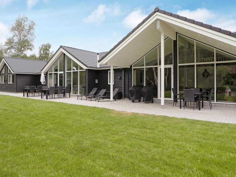 Das Luxusferienhaus Nr. 543 hat eine tolle Terrasse, die mit hochwertigen Gartenmöbeln für 16 Personen ausgestattet ist.
