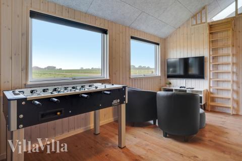 Aktivitätsraum im Luxusferienhaus Nr. 544 mit 5 Schlafzimmern und Platz für 14 Gäste.