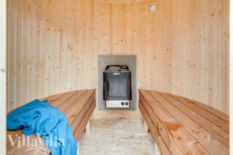 Genießen Sie die heiße Sauna im Luxusferienhaus Nr. 544 für 14 Personen