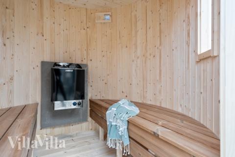 Genießen Sie die heiße Sauna im Luxusferienhaus Nr. 549 für 14 Personen