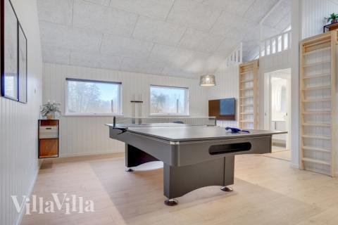 Neben den vielen schönen Stunden, die man im Poolbereich des Hauses verbringen kann, bietet das Luxusferienhaus 549 auch Spielevergnügen bei Billard/Tischtennis und Darts