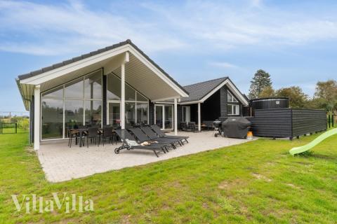 Das Luxusferienhaus Nr. 549 hat eine tolle Terrasse, die mit hochwertigen Gartenmöbeln für 14 Personen ausgestattet ist.