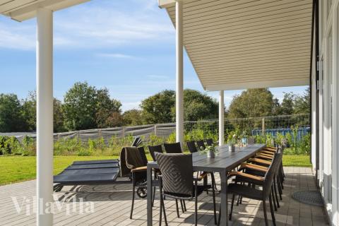 Genießen Sie einen Grillabend auf der Terrasse des Luxusferienhauses Nr. 549 in Nordseeland