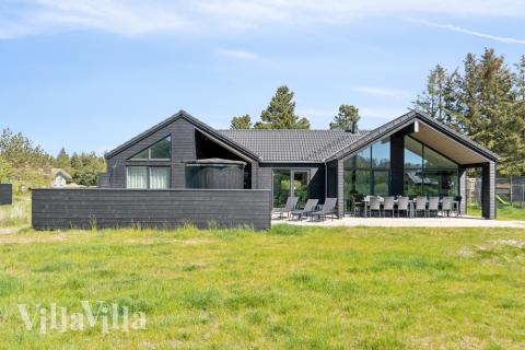 Dieses schöne Poolhaus Nr. 540 mit Platz für 14 Personen liegt in Westjütland