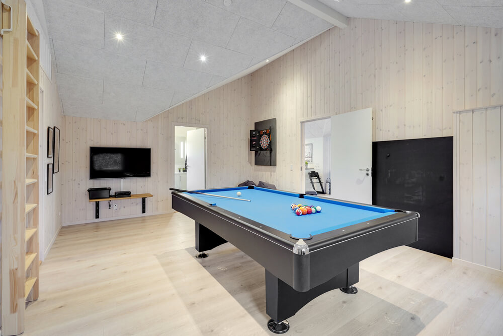 Neben den vielen schönen Stunden, die man im Poolbereich des Hauses verbringen kann, bietet das Luxusferienhaus 550 auch Spielevergnügen bei Billard/Tischtennis und Darts
