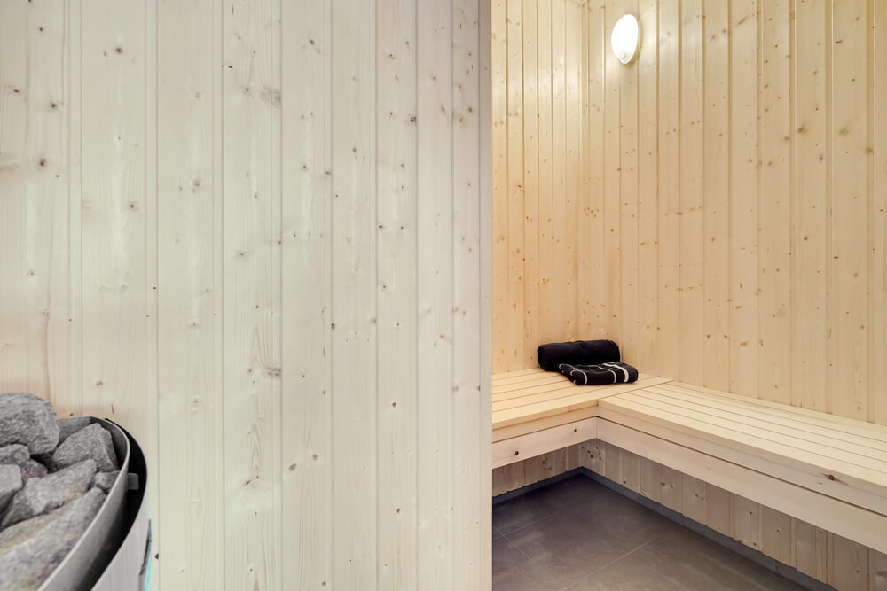 Genießen Sie die heiße Sauna im Luxusferienhaus Nr. 550 für 14 Personen