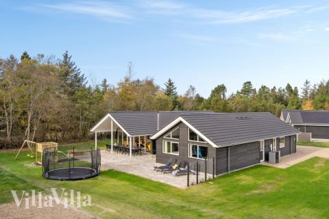 Dieses schöne Poolhaus Nr. 568 mit Platz für 16 Personen liegt in Westjütland